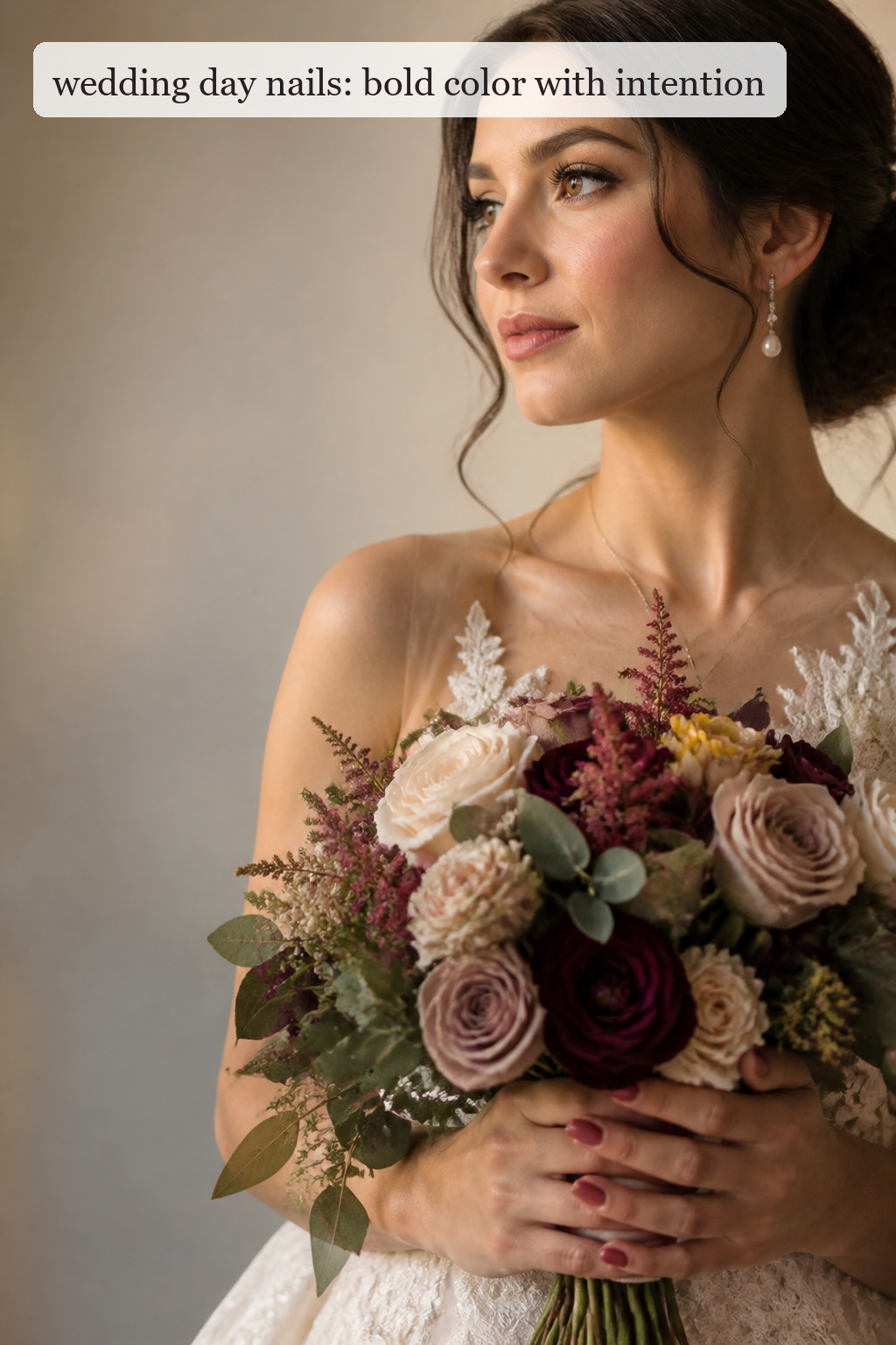 Wedding day nails with glossy muted berry polish and bridal bouquet