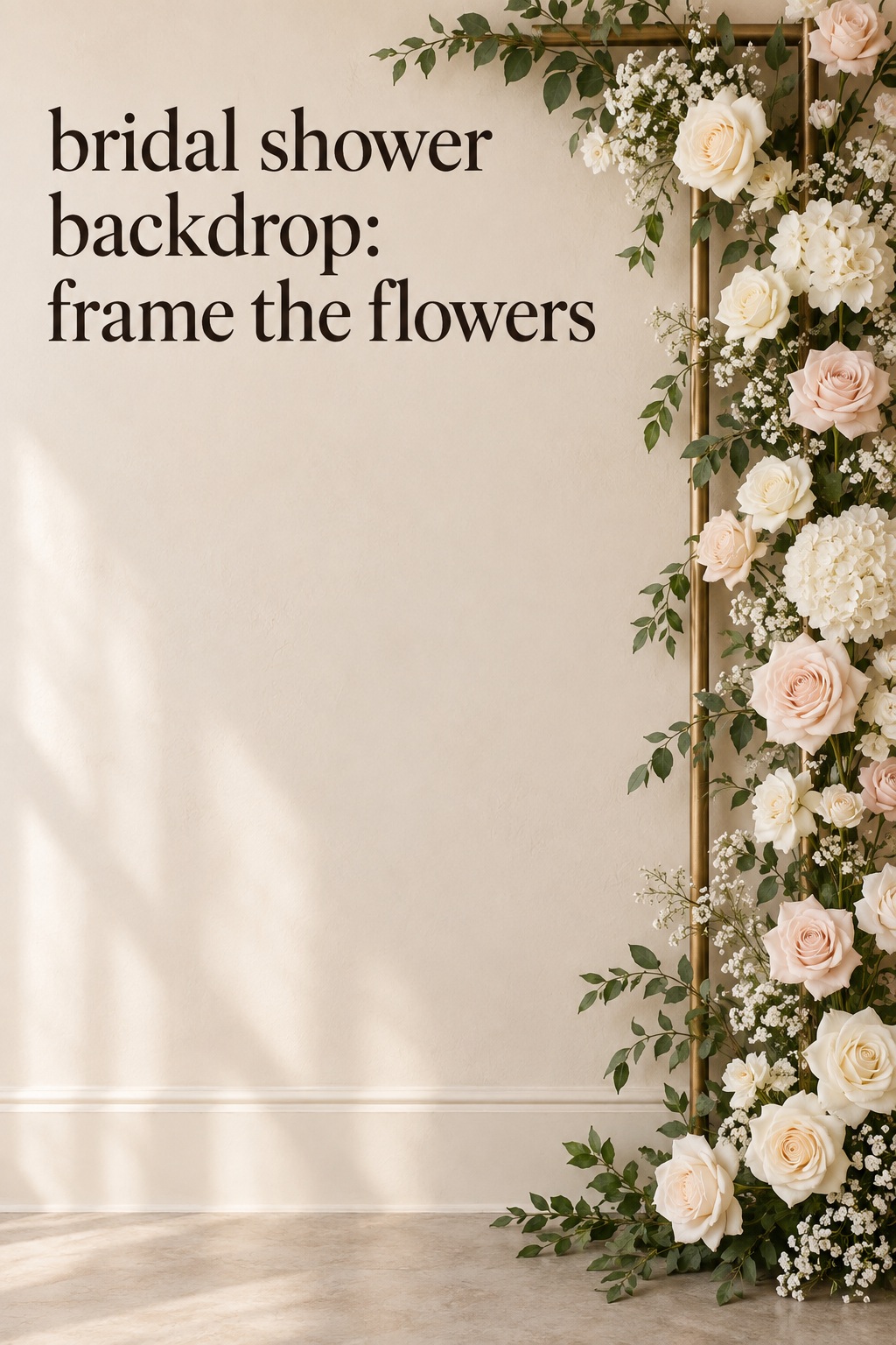 Ivory flower frame beside a text-forward bridal shower backdrop wall